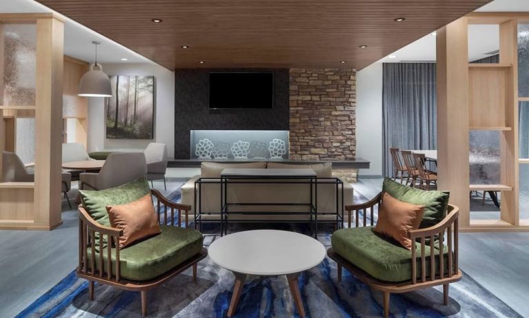 Lobby and coworking lounge at Fairfield Inn & Suites By Marriott Kenosha Pleasant Prairie.