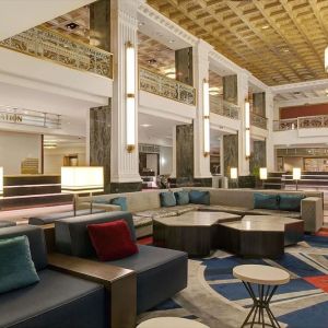 Lobby and coworking lounge at The New Yorker Hotel, A Wyndham Hotel.