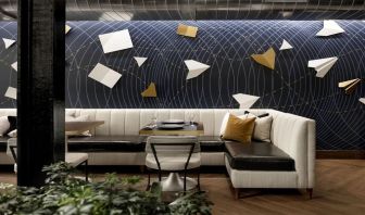 Lobby and coworking lounge at Rand Tower Hotel, Minneapolis, A Marriott Tribute Portfolio Hotel.
