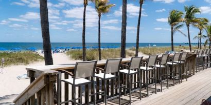 Sun deck with a view of the ocean at Plunge Beach Resort.