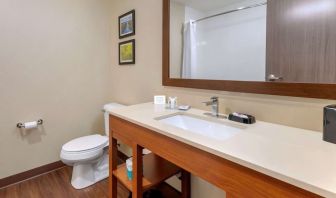 Guest bathroom with shower at Comfort Inn & Suites Mankato.
