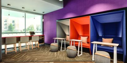Comfortable working space with natural light at Tru By Hilton Wichita Northeast.
