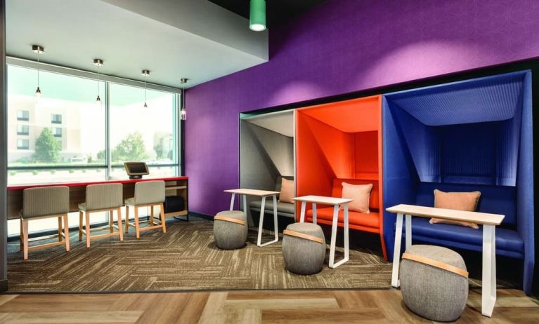 Comfortable working space with natural light at Tru By Hilton Wichita Northeast.
