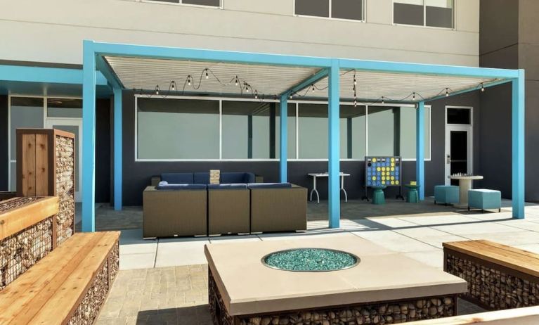 Comfortable patio perfect for coworking at Tru By Hilton Wichita Northeast.
