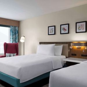 Day use twin room with lounge seating at Hilton Garden Inn Kennett Square.