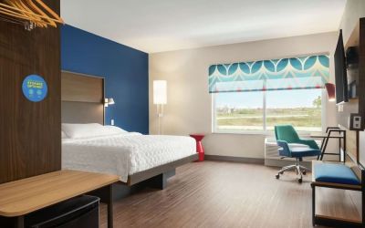 Spacious day use room with work desk at Tru By Hilton Milwaukee Brookfield.