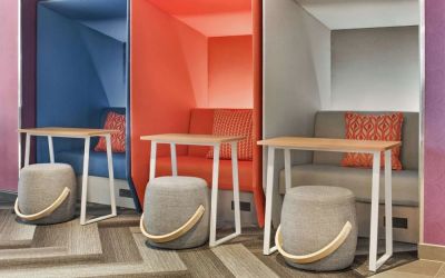 Comfortable and sound-proof workspace cubicles at Tru By Hilton Milwaukee Brookfield.