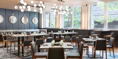 Dining area perfect for coworking at The Slate Denver, Tapestry Collection By Hilton.