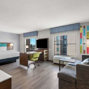 Day use room with living area at Hampton Inn & Suites Phoenix/Gilbert.