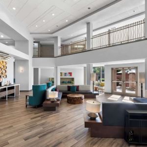 Lobby and coworking lounge at Hampton Inn & Suites Phoenix/Gilbert.