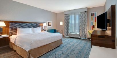Spacious day use room with work desk at Hampton Inn & Suites Sunnyvale Silicon Valley.