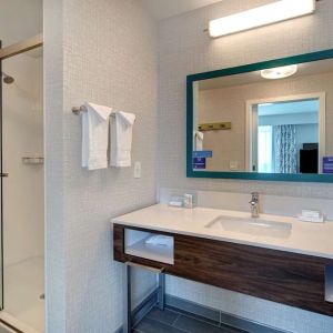 Guest bathroom with shower at Hampton Inn & Suites Sunnyvale Silicon Valley.