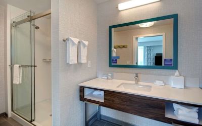 Guest bathroom with shower at Hampton Inn & Suites Sunnyvale Silicon Valley.