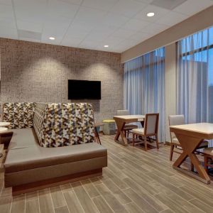 Lobby and coworking lounge at Hampton Inn & Suites Sunnyvale Silicon Valley.