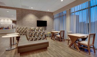 Lobby and coworking lounge at Hampton Inn & Suites Sunnyvale Silicon Valley.