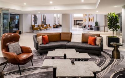 Lobby and coworking lounge at Hilton Dallas Lincoln Centre.