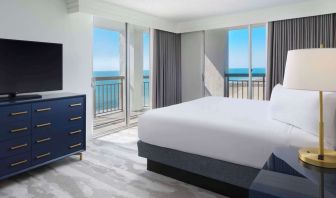 Day use room with balcony overlooking the ocean at Embassy Suites By Hilton Myrtle Beach Oceanfront Resort.