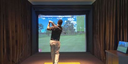 Golf simulators available at Embassy Suites By Hilton Myrtle Beach Oceanfront Resort.