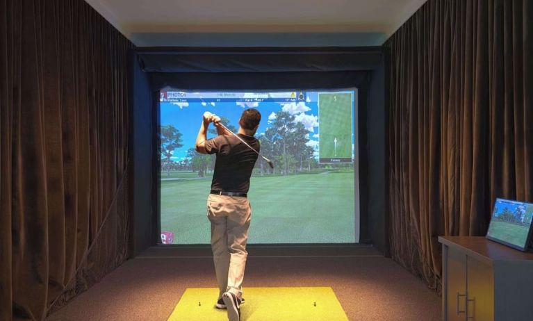Golf simulators available at Embassy Suites By Hilton Myrtle Beach Oceanfront Resort.