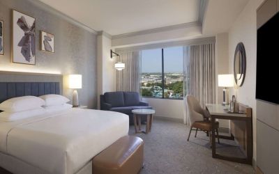 Day use room with work desk and sofa at Hilton Anatole.