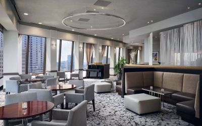 Dining area with natural light perfect for coworking at Hilton Atlanta.