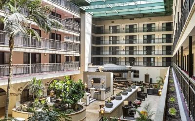 Lobby and coworking lounge at Embassy Suites By Hilton Los Angeles International Airport South.