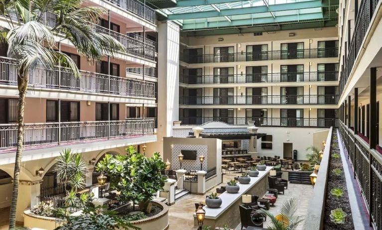 Lobby and coworking lounge at Embassy Suites By Hilton Los Angeles International Airport South.