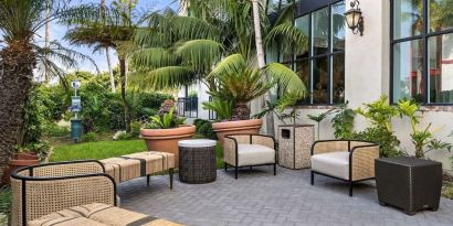 Plenty of seats in the courtyard of Embassy Suites By Hilton Los Angeles International Airport South.