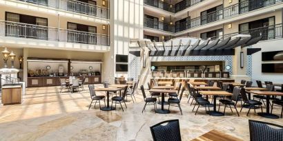 Dining area perfect for coworking at Embassy Suites By Hilton Los Angeles International Airport South.