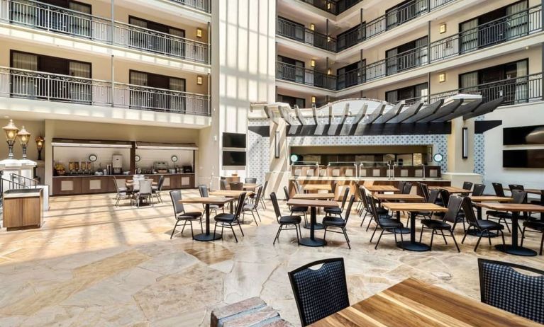 Dining area perfect for coworking at Embassy Suites By Hilton Los Angeles International Airport South.