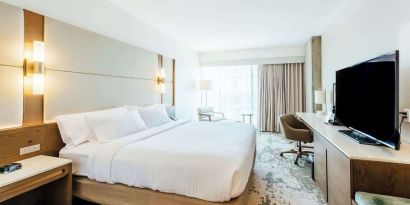 Day use room with work desk and natural light at Hilton Garden Inn Denver Union Station.
