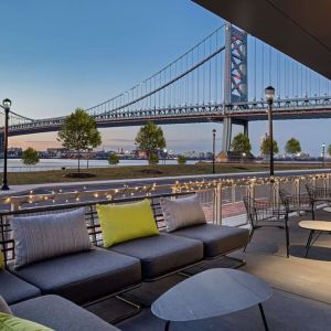 Outdoor furniture perfect for coworking at Hilton Garden Inn Camden Waterfront Philadelphia.