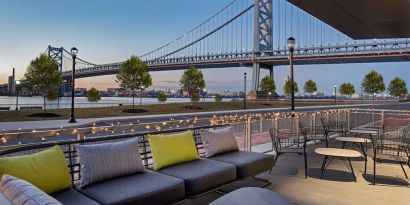 Outdoor furniture perfect for coworking at Hilton Garden Inn Camden Waterfront Philadelphia.