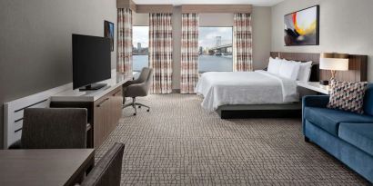 Spacious day use room with living area at Hilton Garden Inn Camden Waterfront Philadelphia.