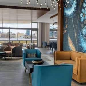 Lobby and coworking lounge at Hilton Garden Inn Camden Waterfront Philadelphia.