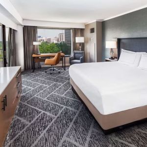 Day use room with work desk and natural light at DoubleTree By Hilton Tulsa - Warren Place.