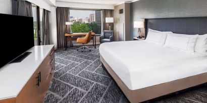 Day use room with work desk and natural light at DoubleTree By Hilton Tulsa - Warren Place.