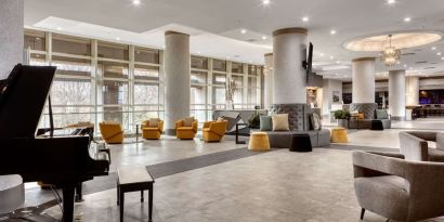Lobby and coworking lounge at DoubleTree By Hilton Tulsa - Warren Place.