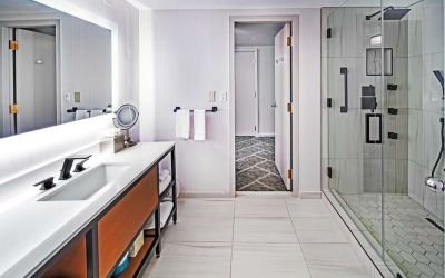 Guest bathroom with shower at DoubleTree By Hilton Tulsa - Warren Place.