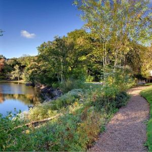 Trail by the river at Hilton Chicago-Northbrook.