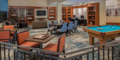 Game room with chess and billiards table at DoubleTree By Hilton Sonoma Wine Country.