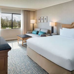 Day use room with work desk and sofa at DoubleTree By Hilton Sonoma Wine Country.