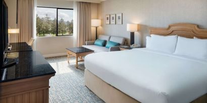 Day use room with work desk and sofa at DoubleTree By Hilton Sonoma Wine Country.