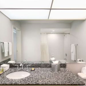 Guest bathroom with shower at DoubleTree By Hilton Sonoma Wine Country.