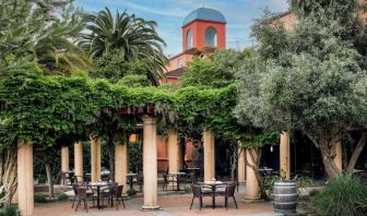 Alfresco dining surrounded by green foliage at DoubleTree By Hilton Sonoma Wine Country.
