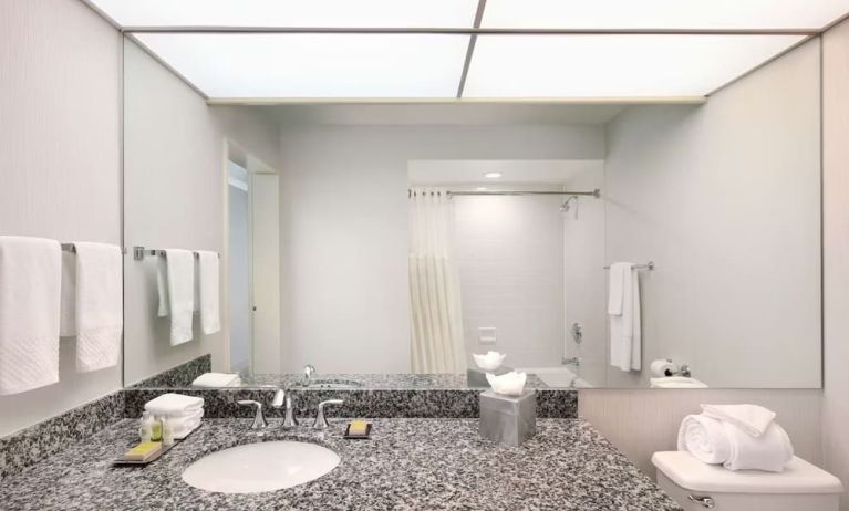 Guest bathroom with shower at DoubleTree By Hilton Sonoma Wine Country.