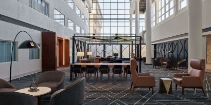 Lobby and coworking space at Delta Hotels By Marriott Little Rock West.