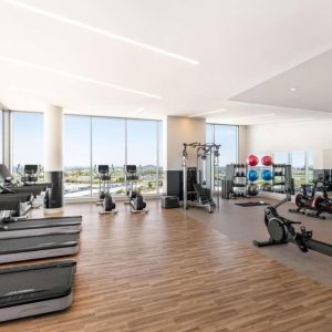 Fully equipped fitness center at Hilton BNA Nashville Airport Terminal.
