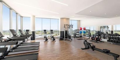 Fully equipped fitness center at Hilton BNA Nashville Airport Terminal.
