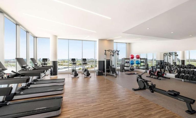 Fully equipped fitness center at Hilton BNA Nashville Airport Terminal.
